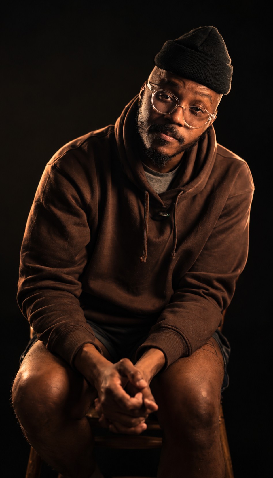 Portrait of Ty Chiko in a beanie and glasses