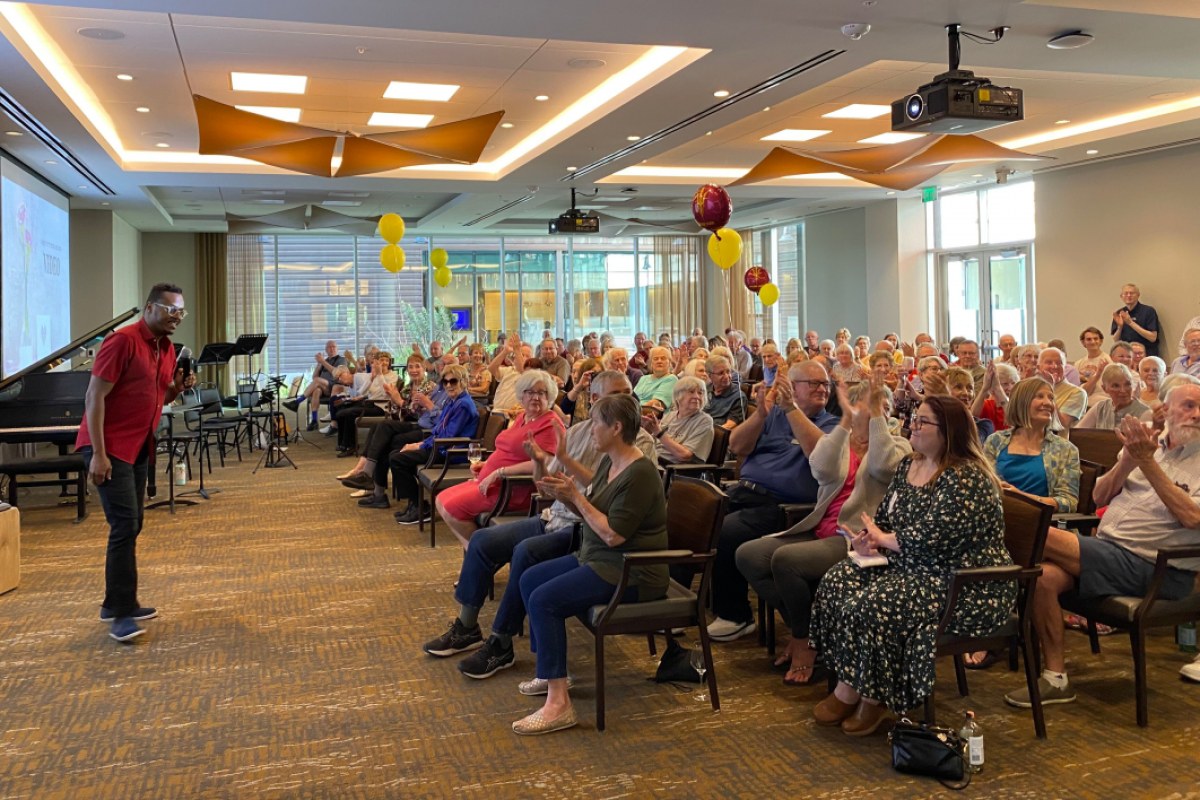 Ty speaking to a full room of residents at Mirabella at ASU